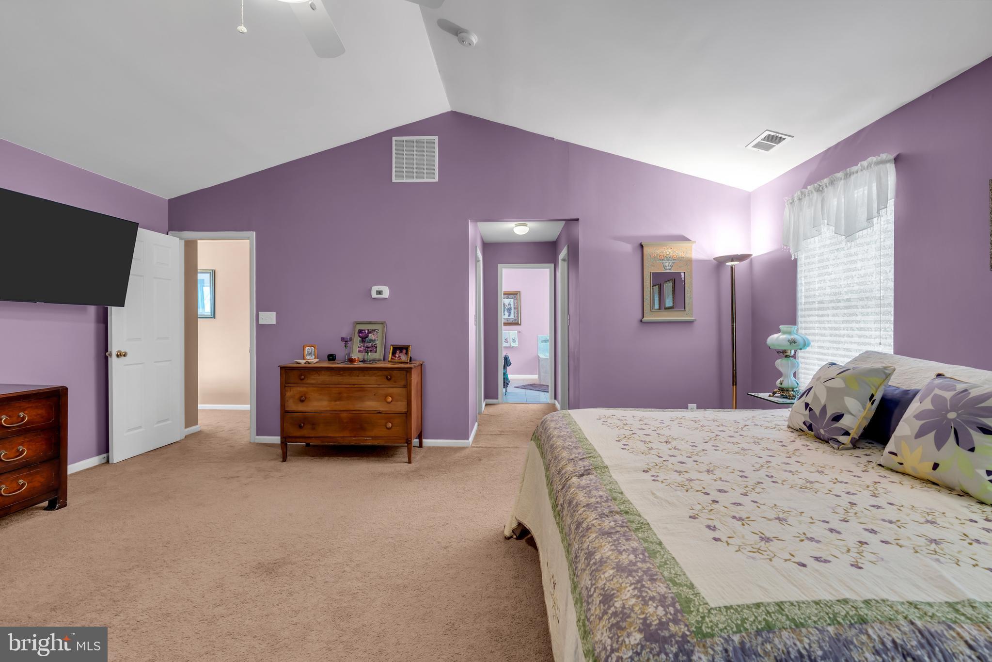 3 Pheasant Court, Unit 2710 Columbus, NJ 08022 - Photo 22 of 39 a bedroom with a bed and a couch
