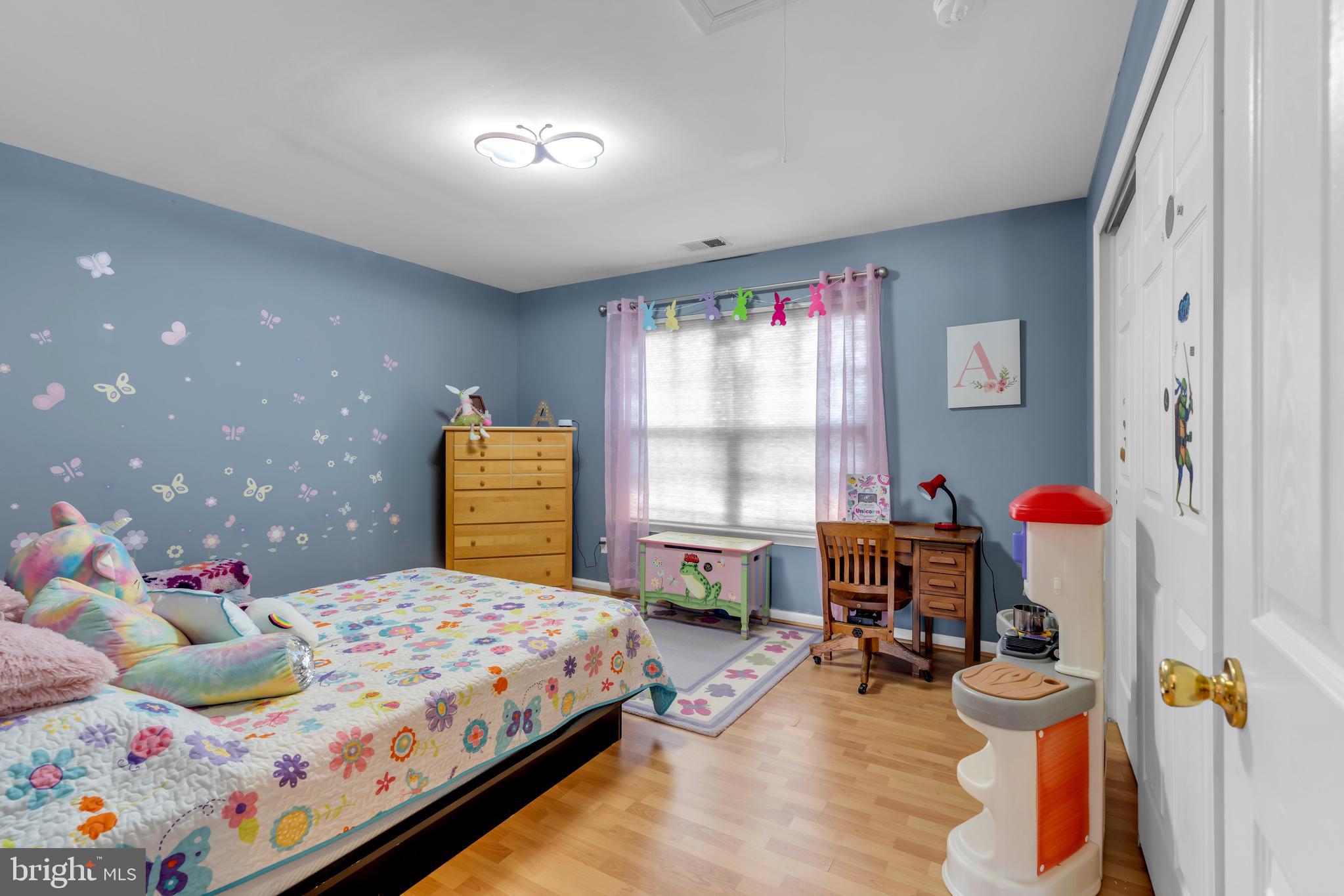 3 Pheasant Court, Unit 2710 Columbus, NJ 08022 - Photo 29 of 39 a bedroom with a bed and a window