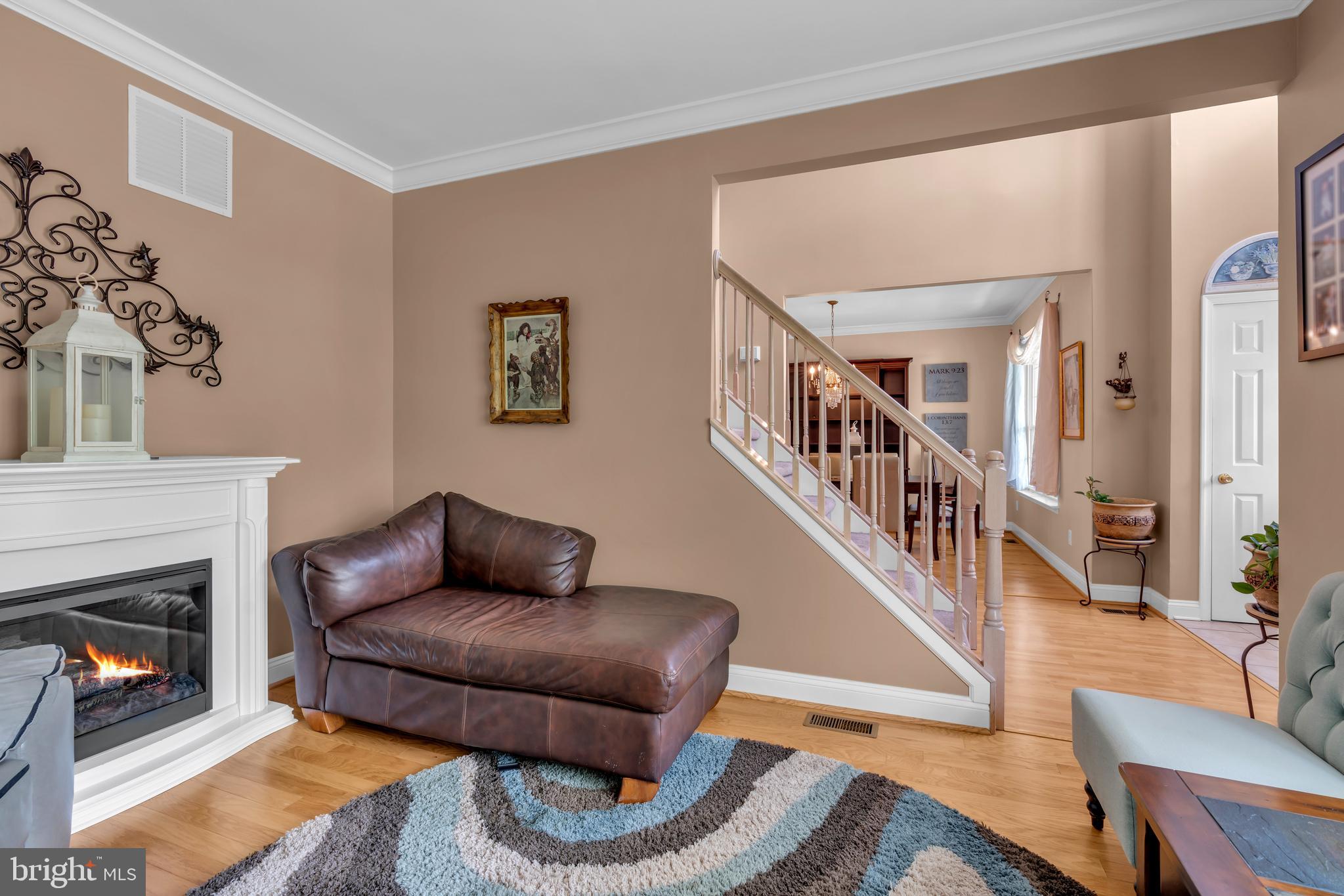 3 Pheasant Court, Unit 2710 Columbus, NJ 08022 - Photo 6 of 39 a living room with furniture and a fireplace