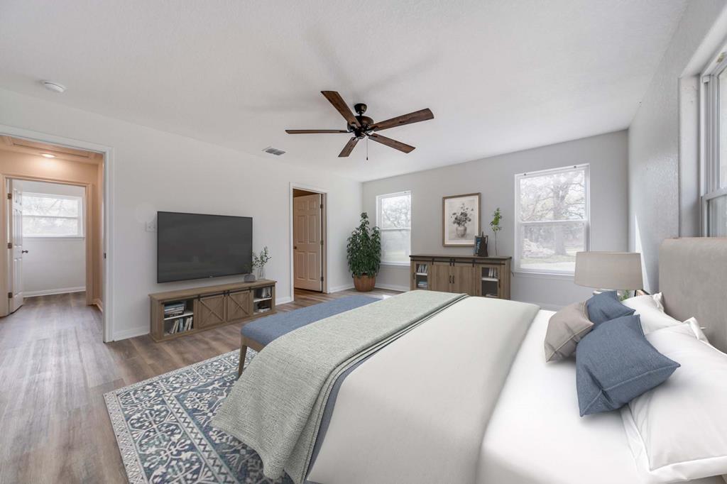 955 Axis Circle Fredericksburg, TX 78624 - Photo 11 of 41 Virtually staged primary bedroom