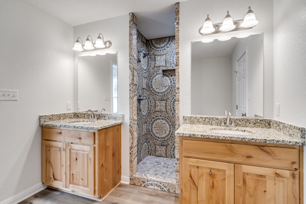 955 Axis Circle Fredericksburg, TX 78624 - Photo 15 of 41 Double vanities with granite counters in primary e