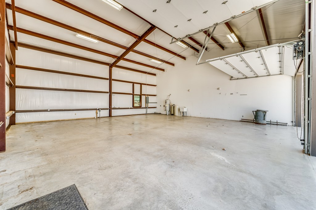 955 Axis Circle Fredericksburg, TX 78624 - Photo 22 of 41 Insulated garage with RV Hookups Extra large roll