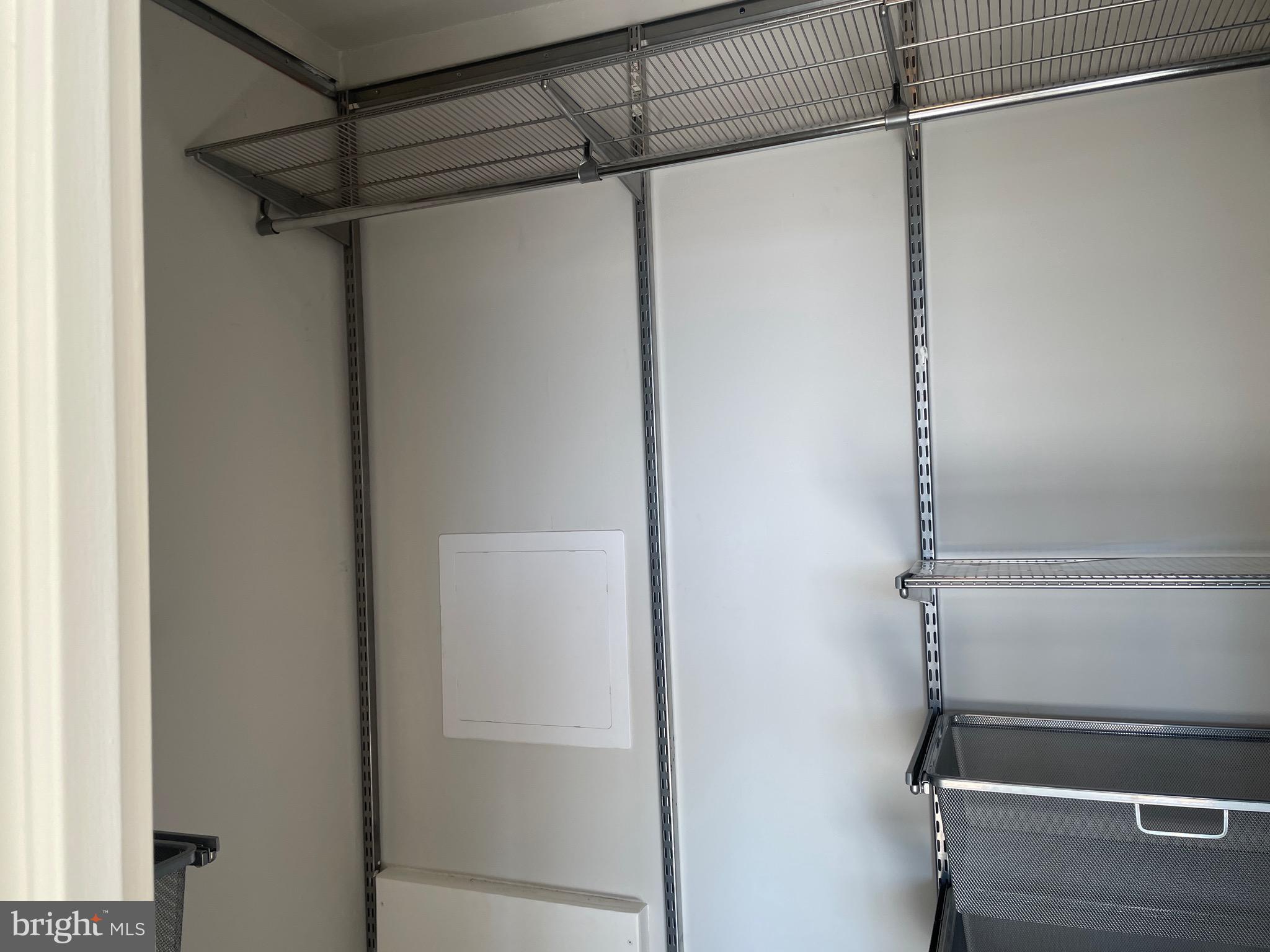 5225 Pooks Hill Road, Unit 828S Bethesda, MD 20814 - Photo 16 of 63 a view of a room with racks on the wall