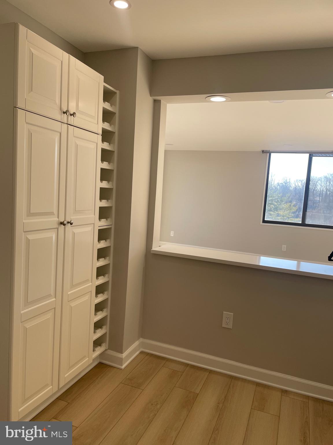 5225 Pooks Hill Road, Unit 828S Bethesda, MD 20814 - Photo 5 of 63 a view of wooden floor and windows in a room