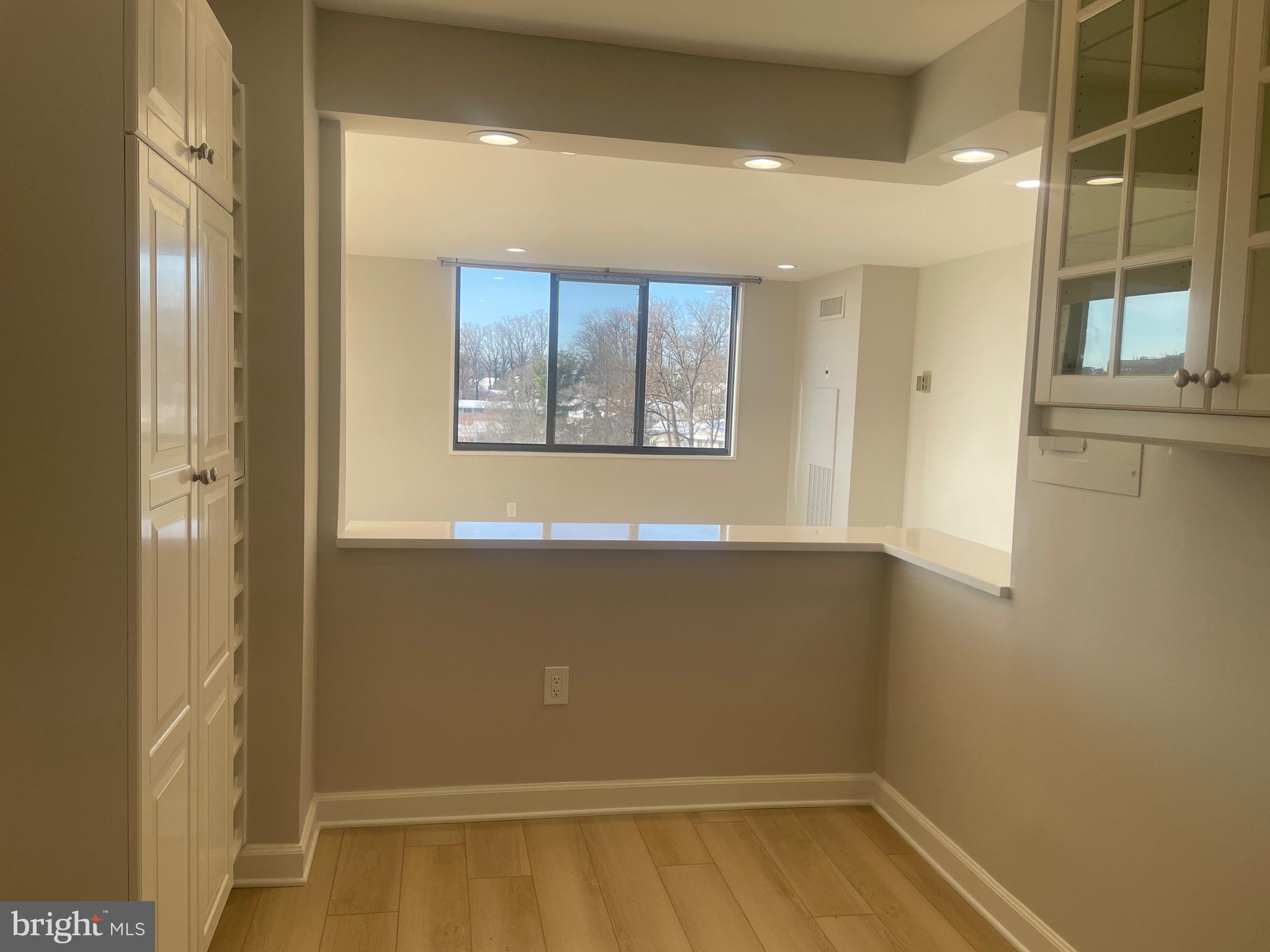 5225 Pooks Hill Road, Unit 828S Bethesda, MD 20814 - Photo 7 of 72 a view of an empty room with a window