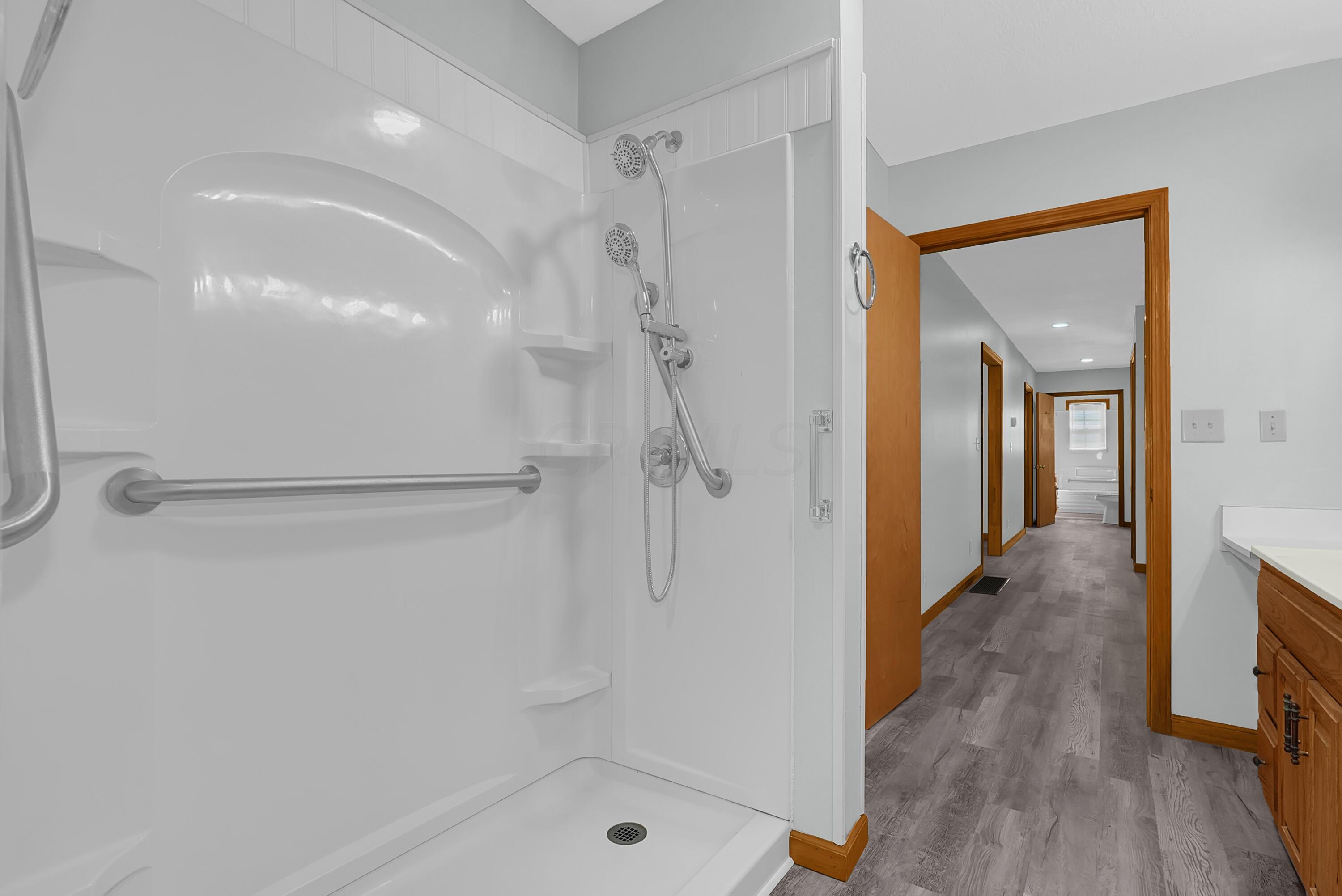 6865 Revenge Road Southwest Lancaster, OH 43130 - Photo 17 of 35 Walk-in shower for handicap accessibility.