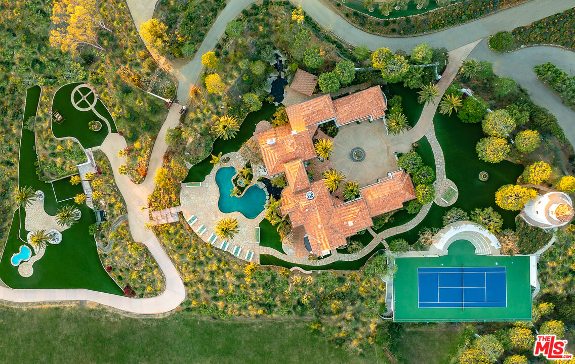 10502 Yellow Hill Road Malibu, CA 90265 - Photo 2 of 22 an aerial view of a house a yard and outdoor seating