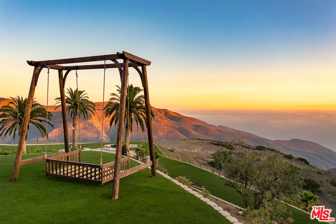 10502 Yellow Hill Road Malibu, CA 90265 - Photo 7 of 22 a view of a backyard with a garden