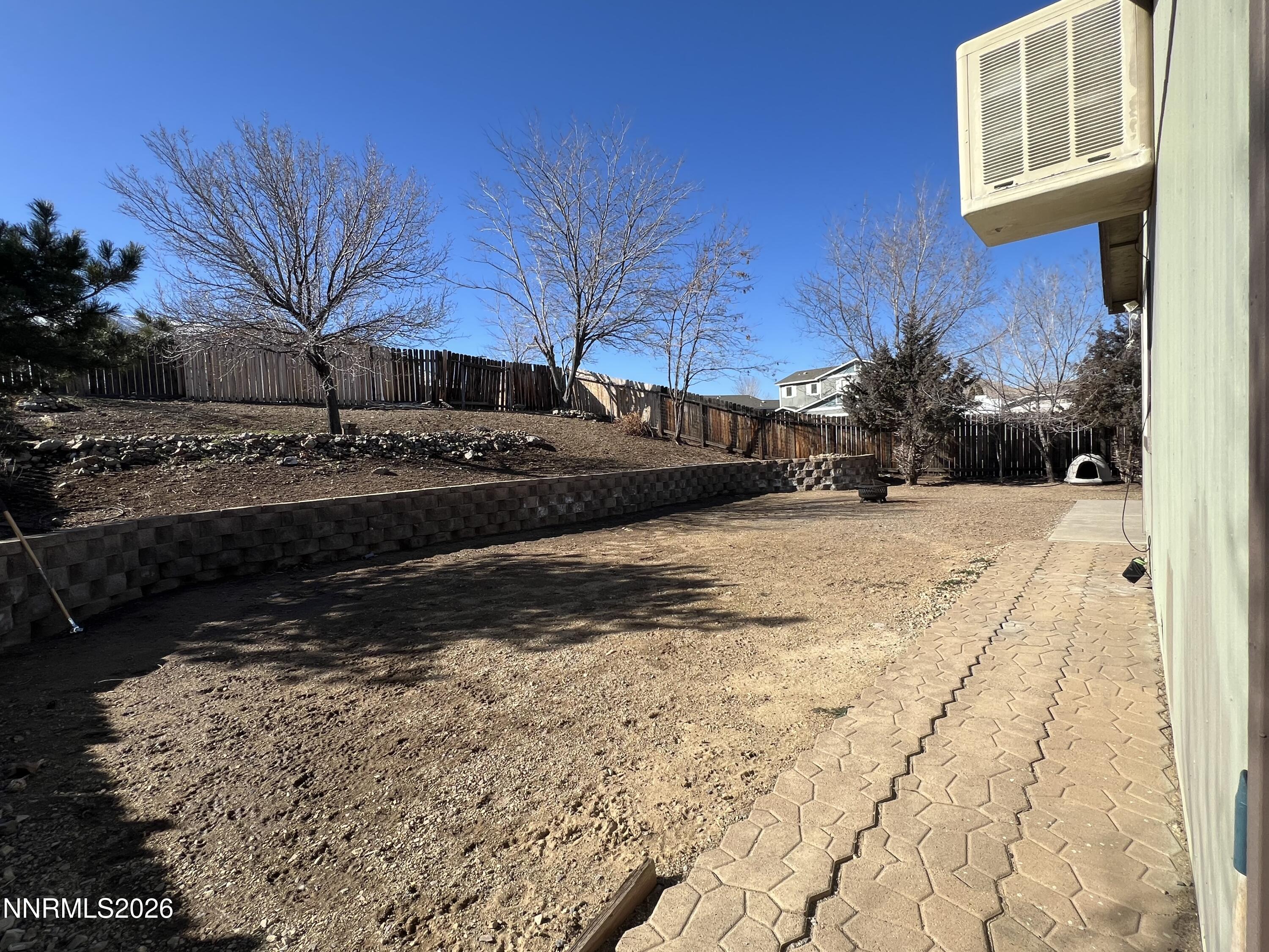 7690 East Key Largo Court Reno, NV 89506 - Photo 6 of 24 a view of a backyard of the house