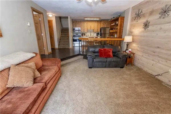 a living room with furniture and a couch