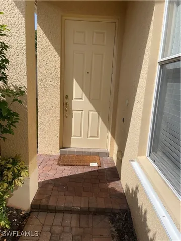 a view of a door front of a house