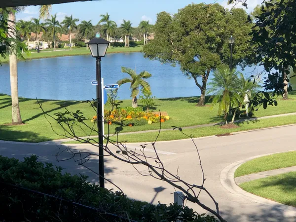 an aerial view of a house with a swimming pool