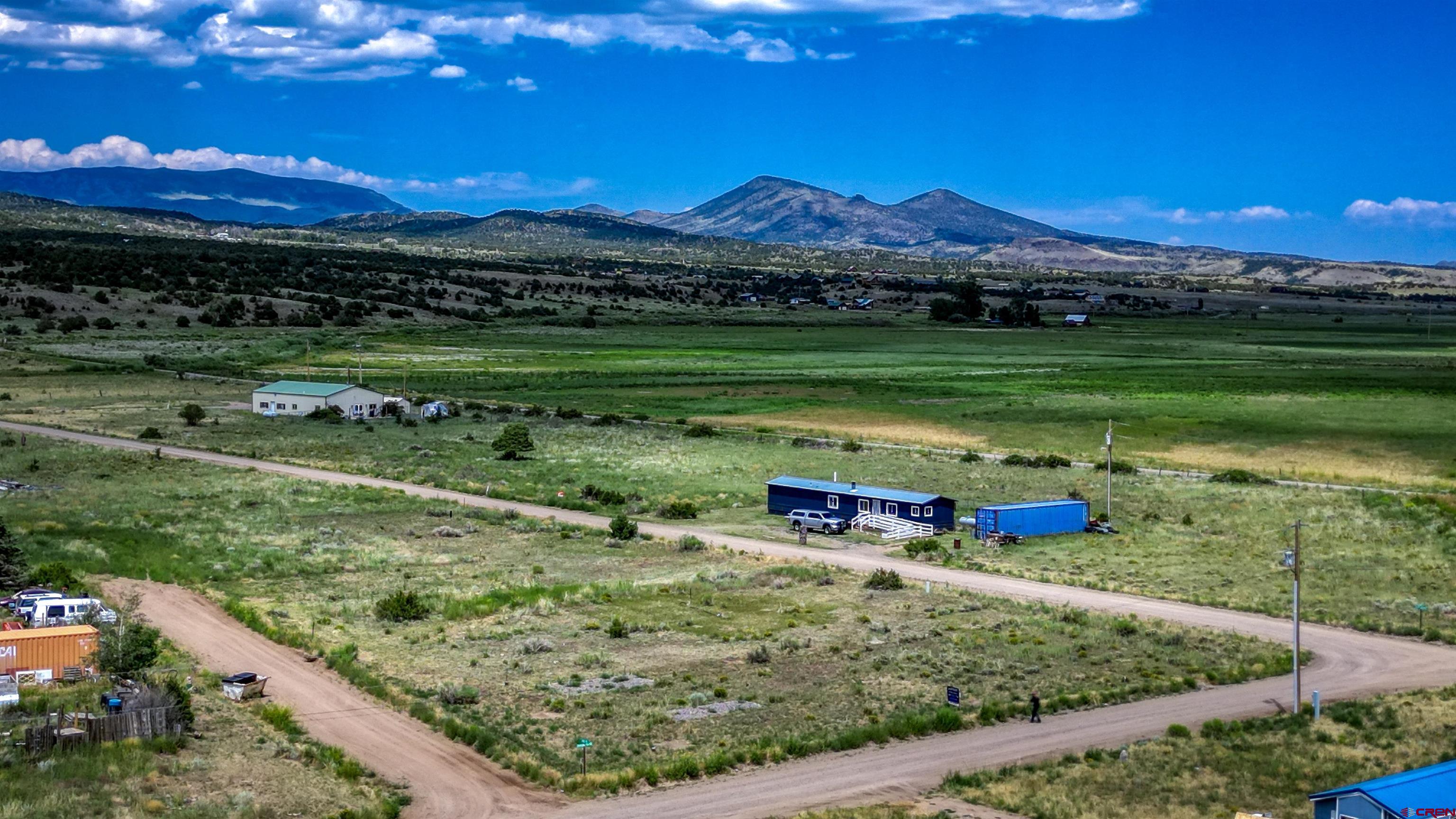 227 Red Feather Road South Fork, CO 81154 - Photo 28 of 32 a view of a golf course with a ocean