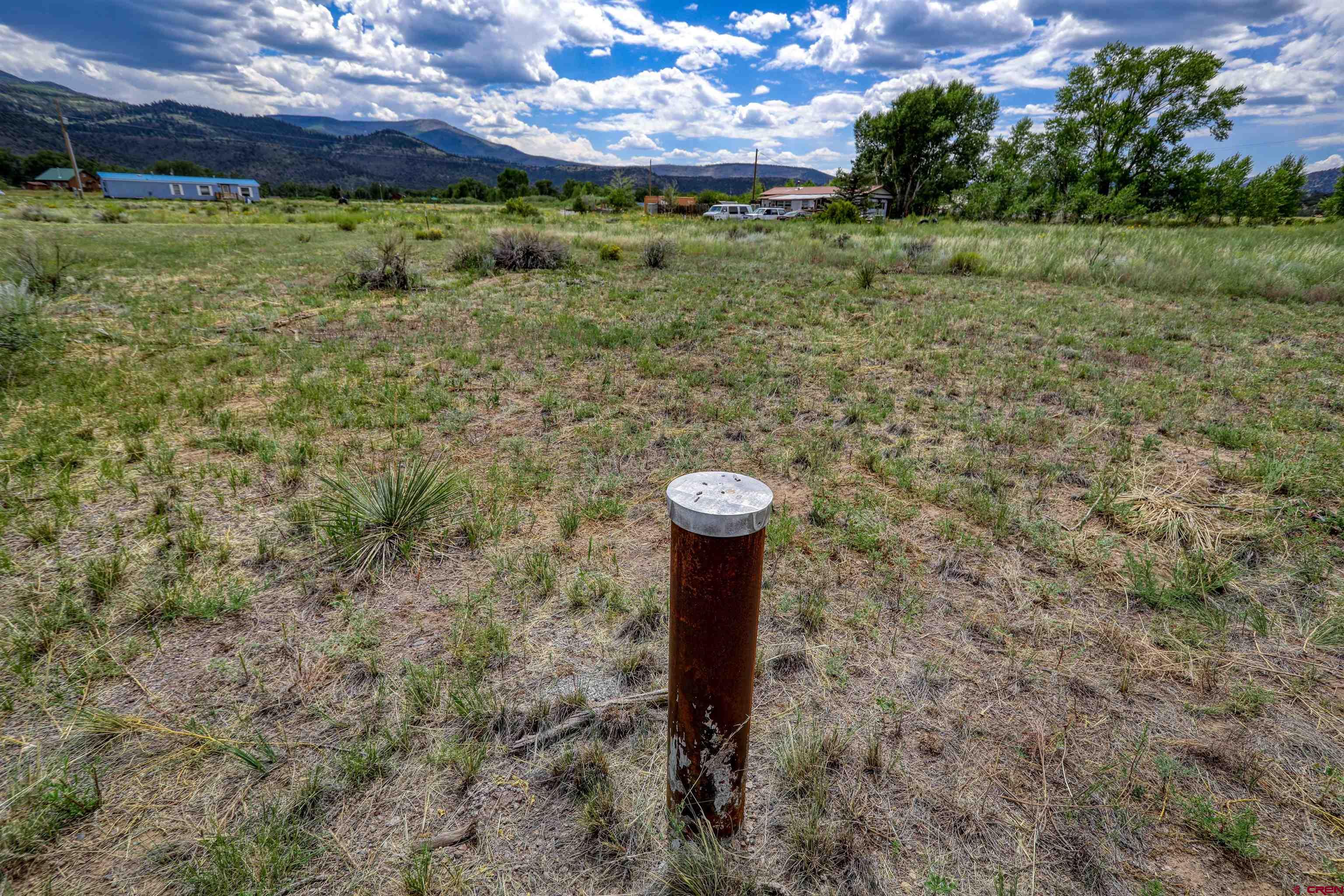 227 Red Feather Road South Fork, CO 81154 - Photo 5 of 32 a view of a garden with a sink