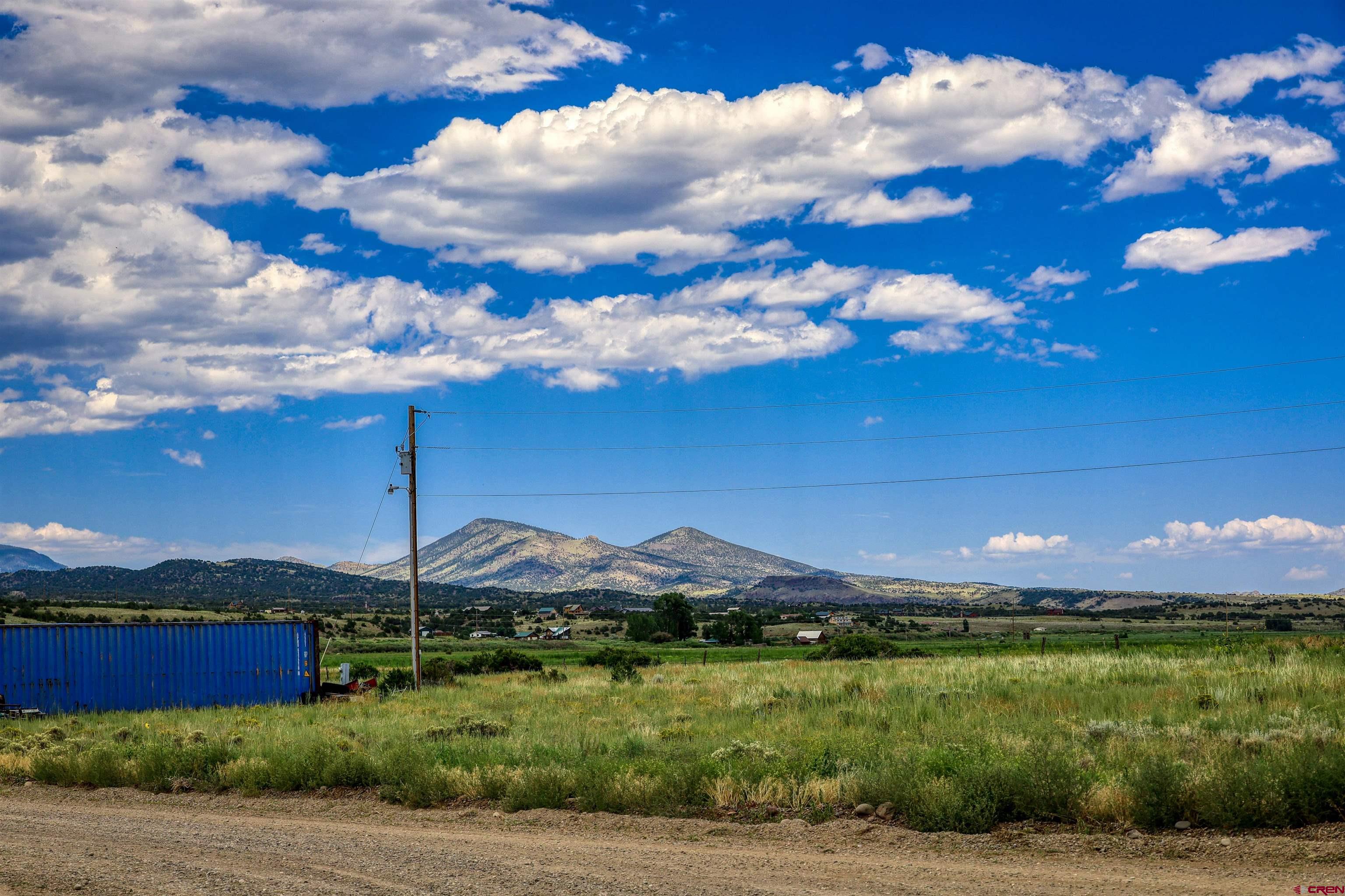 227 Red Feather Road South Fork, CO 81154 - Photo 7 of 32 a view of a lake with a mountain