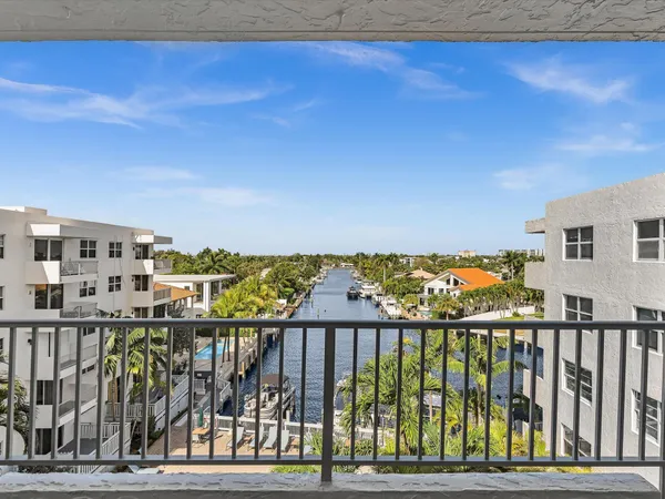 a view of a balcony with an ocean view