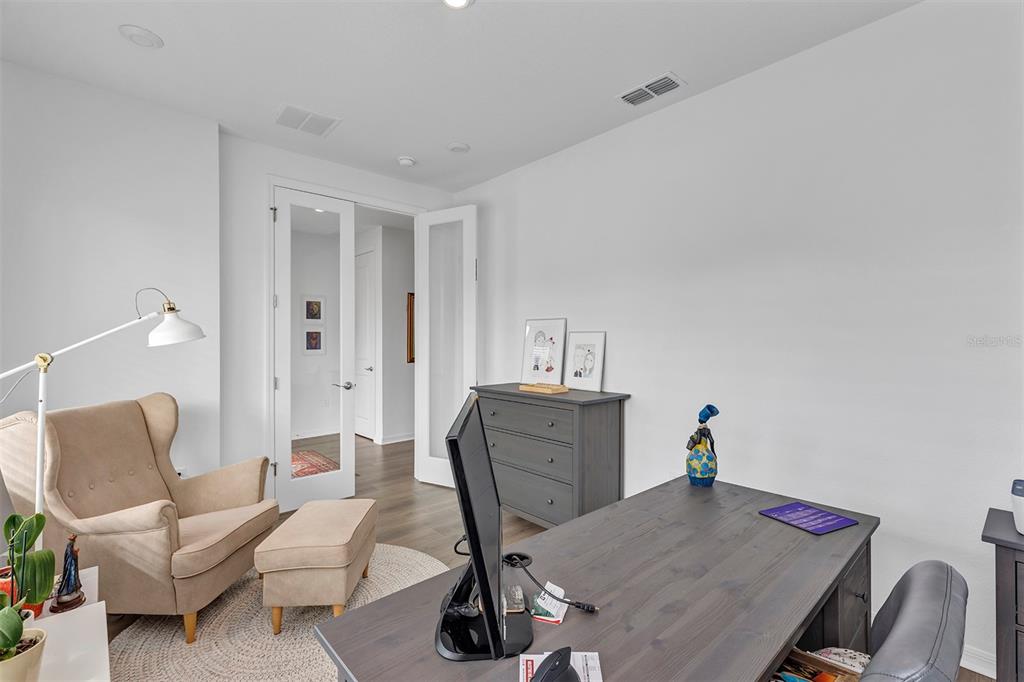 6501 Rover Way St. Cloud, FL 34771 - Photo 14 of 29 a view of a workspace with furniture