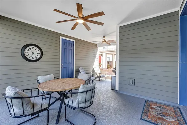 a view of a livingroom with furniture and a table