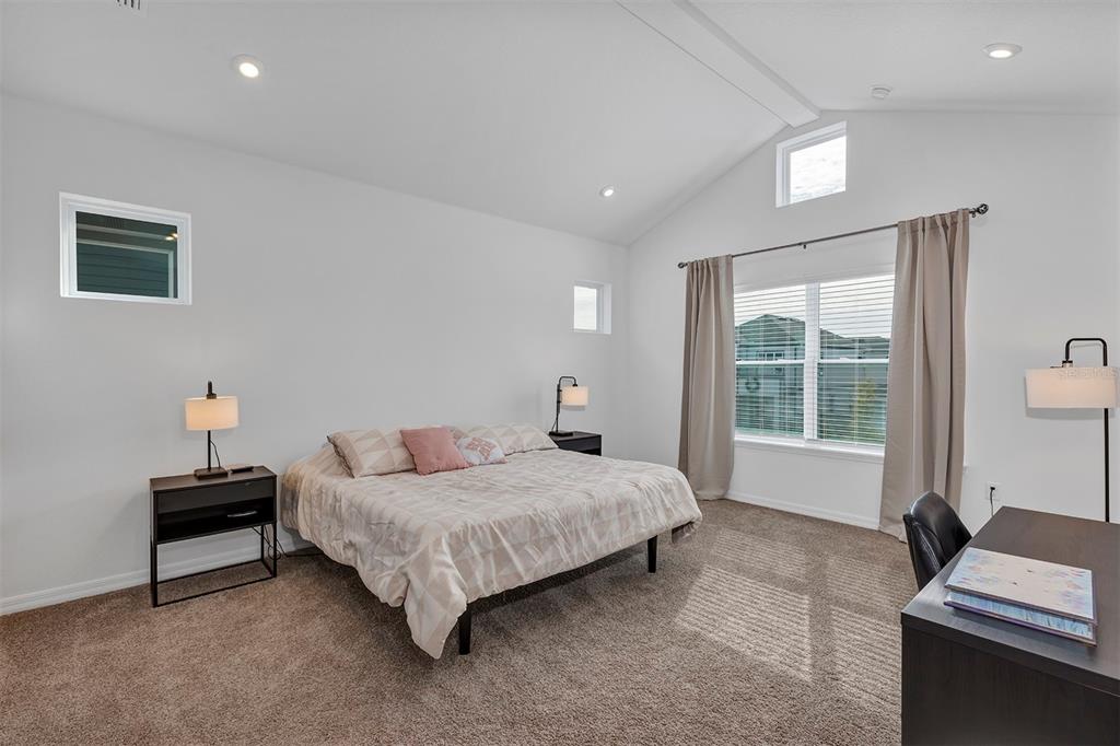 6501 Rover Way St. Cloud, FL 34771 - Photo 17 of 29 a bedroom with a bed and a window