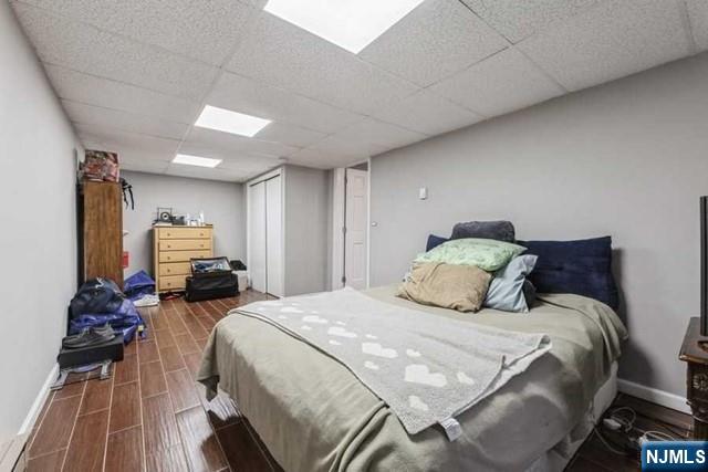 23 Asmus Road Closter, NJ 07624 - Photo 26 of 38 a bedroom with a bed and window