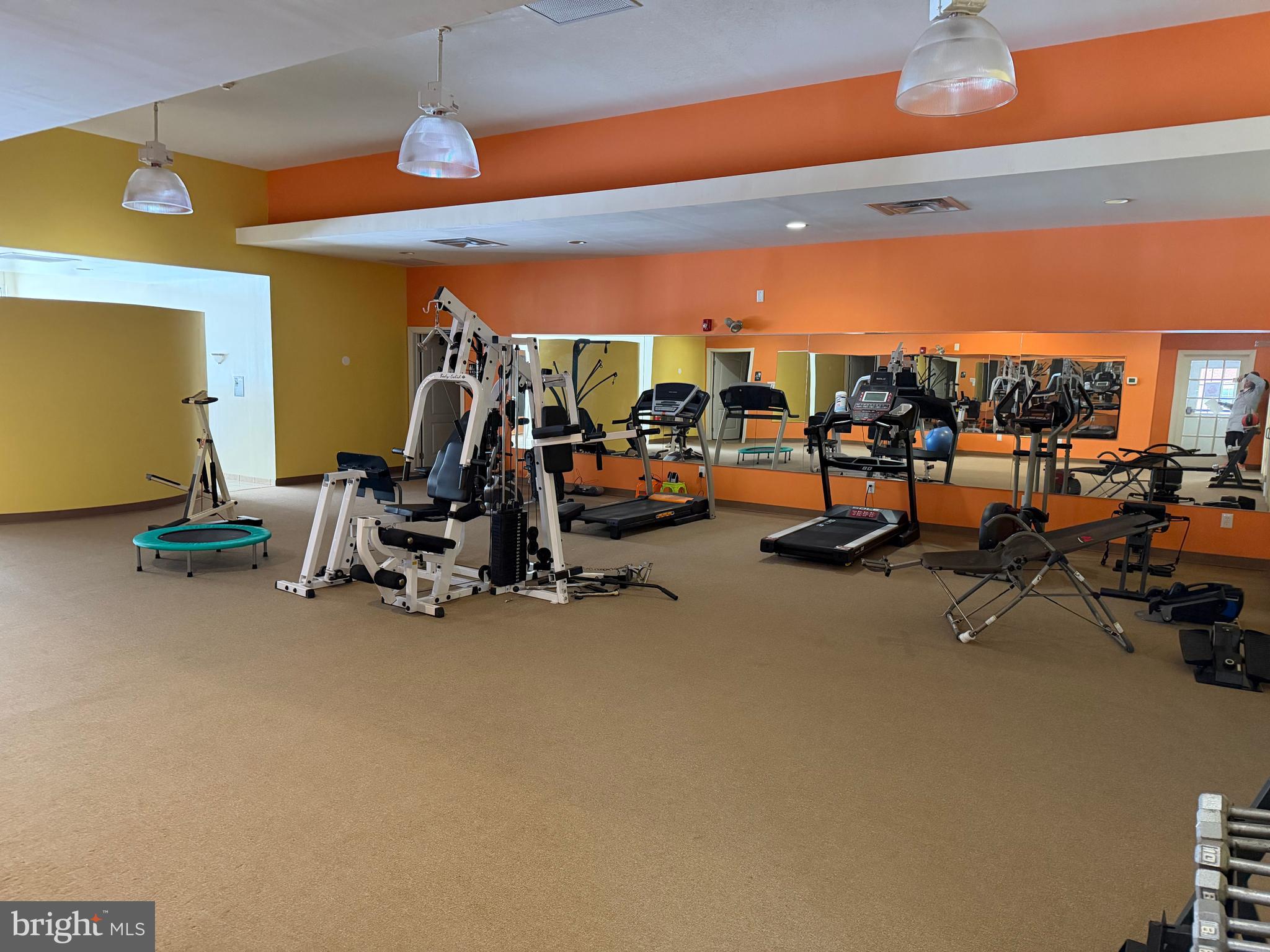 100 Aura Road, Unit 206 Clayton, NJ 08312 - Photo 18 of 25 a view of a room with gym equipment