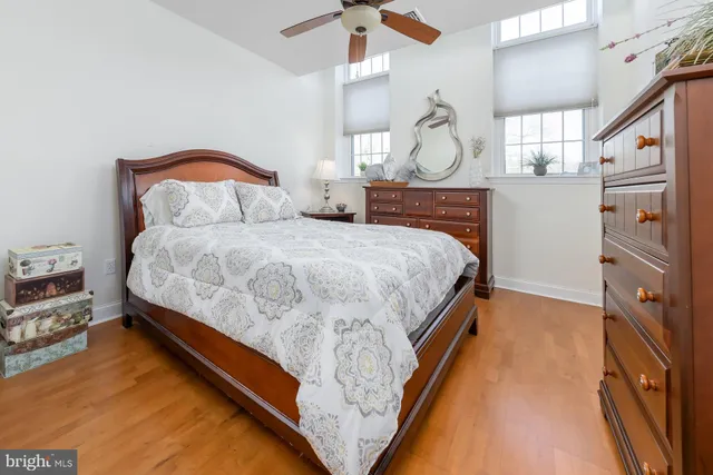 a bedroom with bed and window