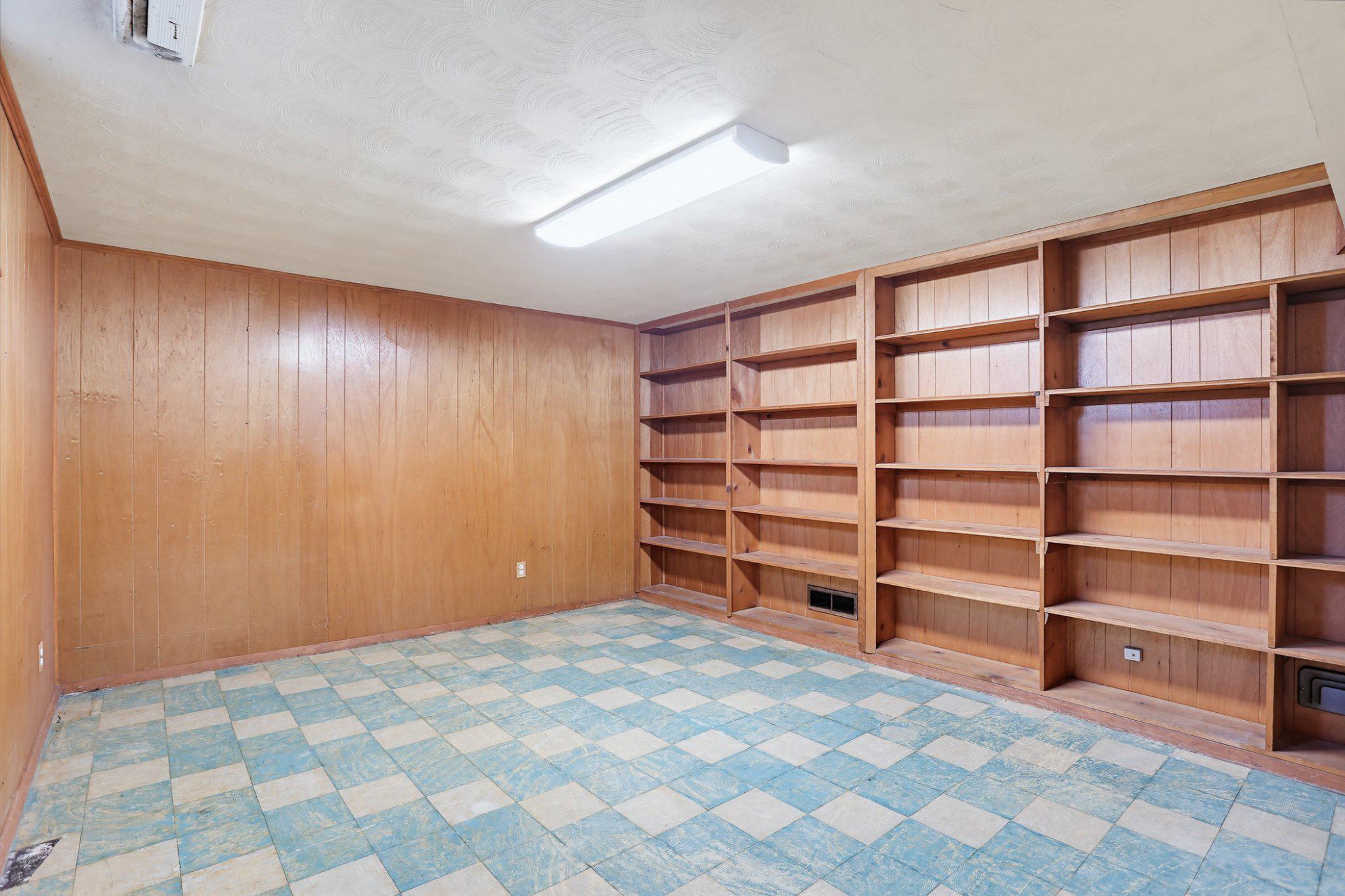 8145 Scotts Level Road Pikesville, MD 21208 - Photo 29 of 45 Bonus room with built-in shelves.