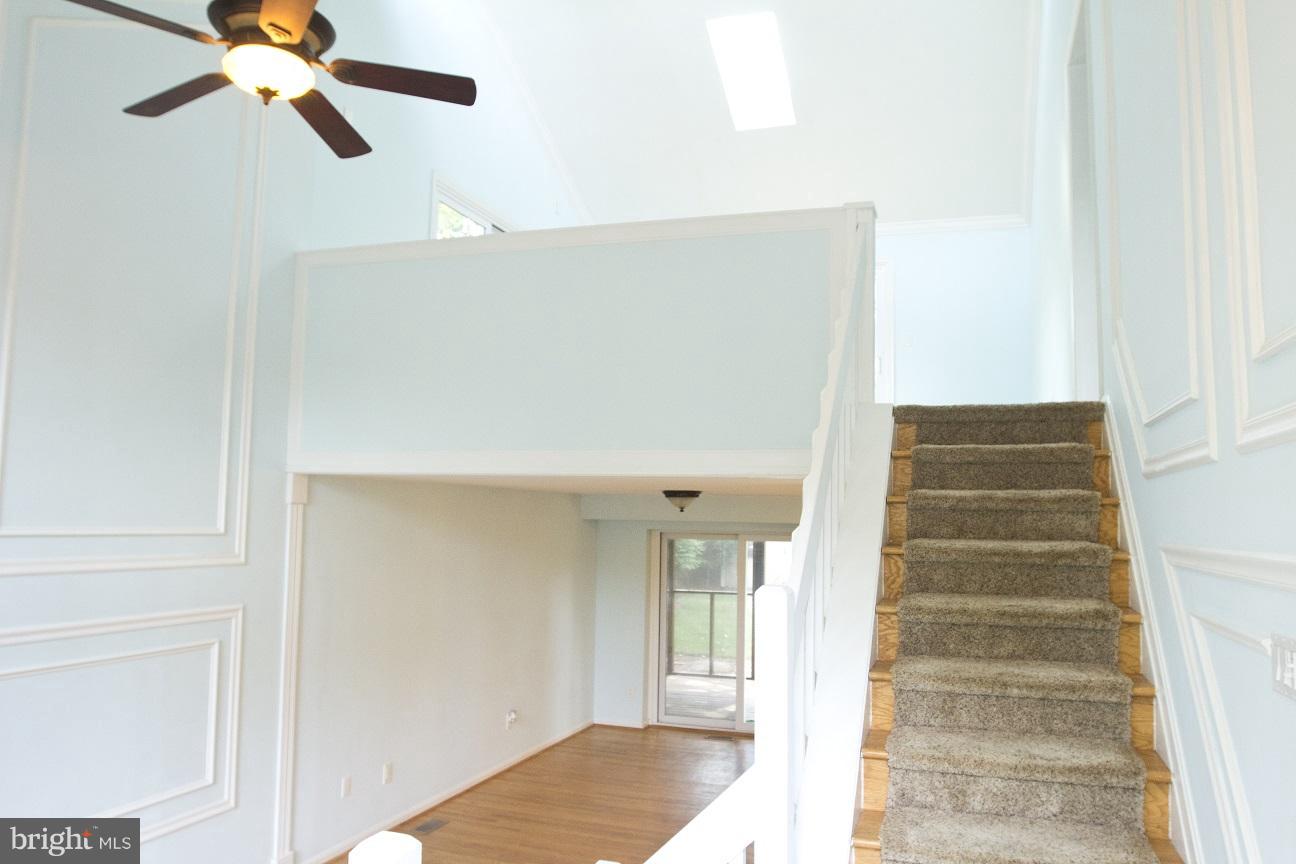 680 Red Cedar Road Annapolis, MD 21409 - Photo 19 of 30 a view of entryway and hall with wooden floor