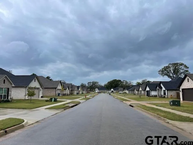 a view of street with houses