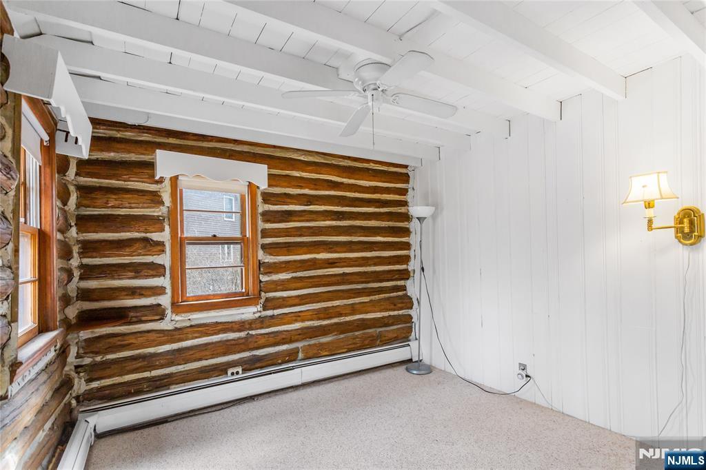 6 Partridge Trail Butler, NJ 07405 - Photo 18 of 37 a view of a room with stairs and a chandelier
