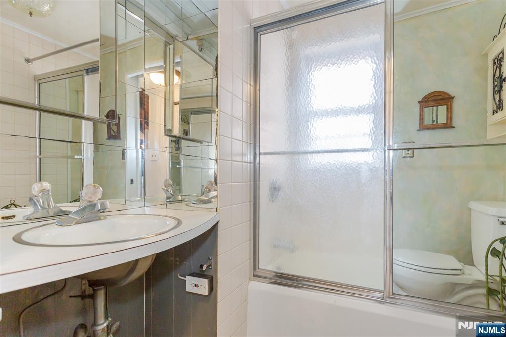 6 Partridge Trail Butler, NJ 07405 - Photo 23 of 37 a bathroom with a sink a toilet and shower