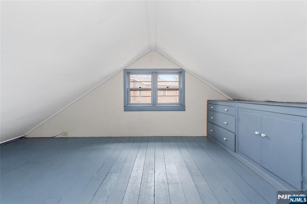 6 Partridge Trail Butler, NJ 07405 - Photo 24 of 37 an empty room with wooden floor and windows