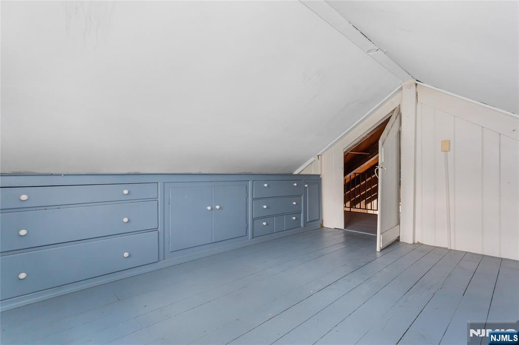 6 Partridge Trail Butler, NJ 07405 - Photo 25 of 37 a view of an empty room with wooden floor