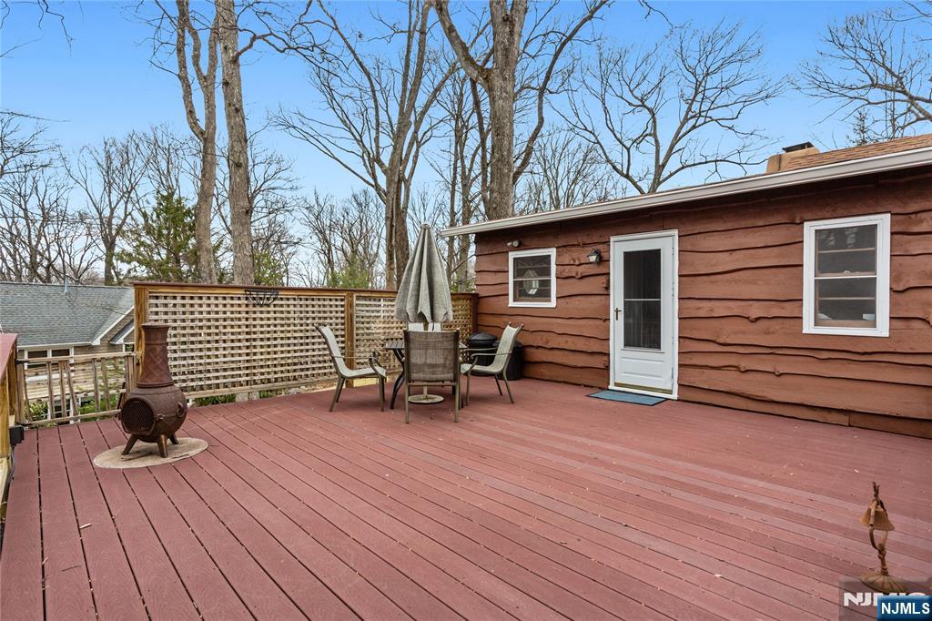 6 Partridge Trail Butler, NJ 07405 - Photo 29 of 37 a view of deck with wooden floor and seating space