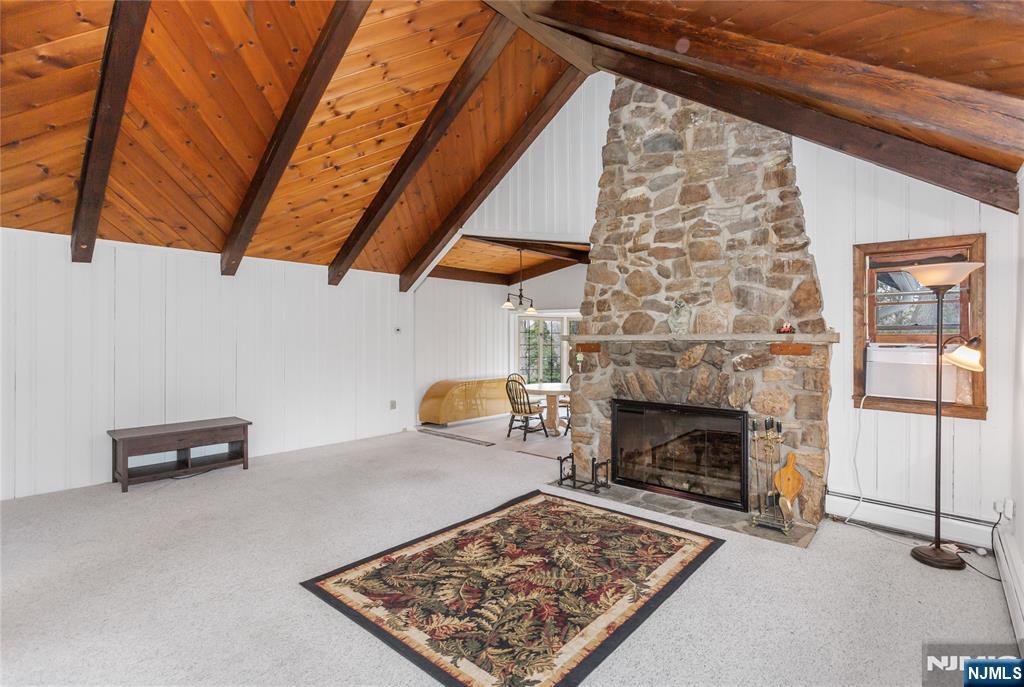 6 Partridge Trail Butler, NJ 07405 - Photo 3 of 37 a living room with furniture and a fireplace