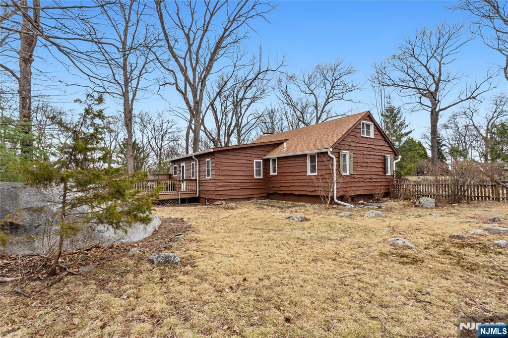 6 Partridge Trail Butler, NJ 07405 - Photo 32 of 37 a front view of a house with a yard