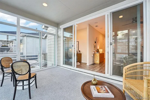 a bathroom with a tub and a mirror
