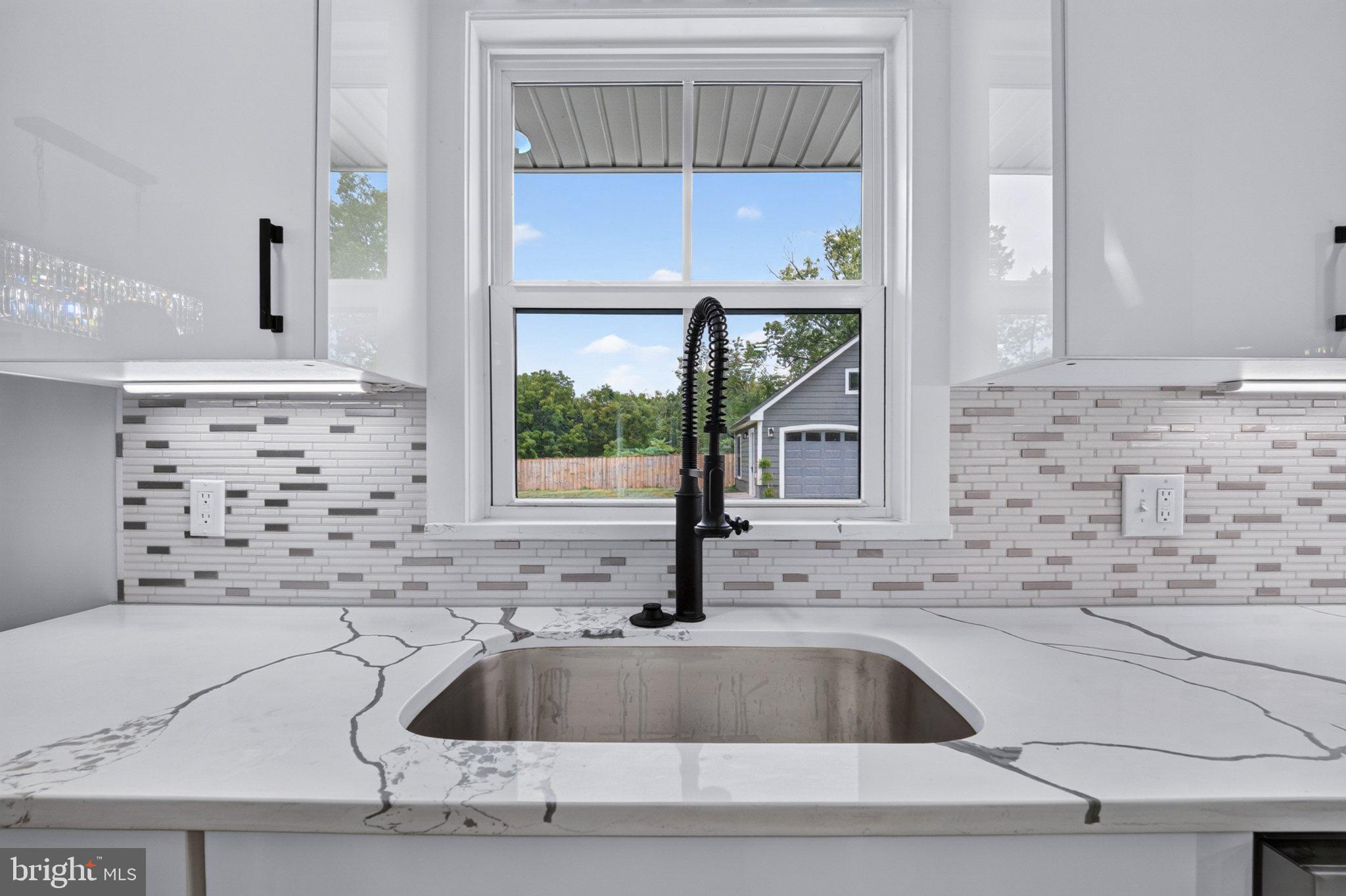 8323 Rolling Road Manassas, VA 20110 - Photo 28 of 97 Modern kitchen with scenic views.