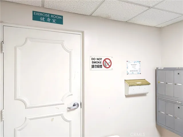 a kitchen with a refrigerator and a refrigerator