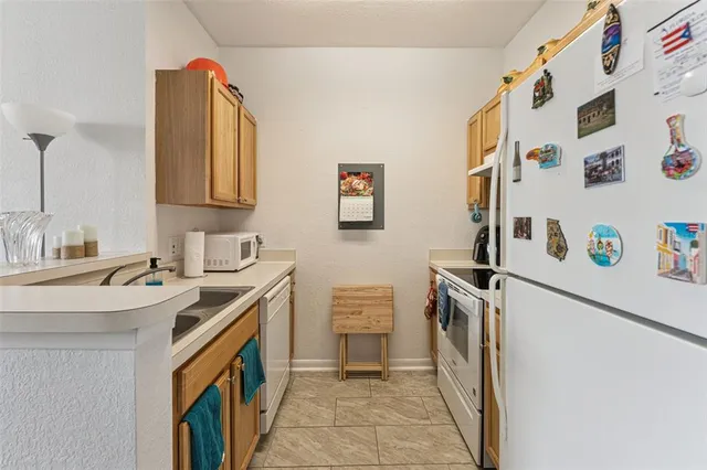 a utility room with a sink a washer and dryer