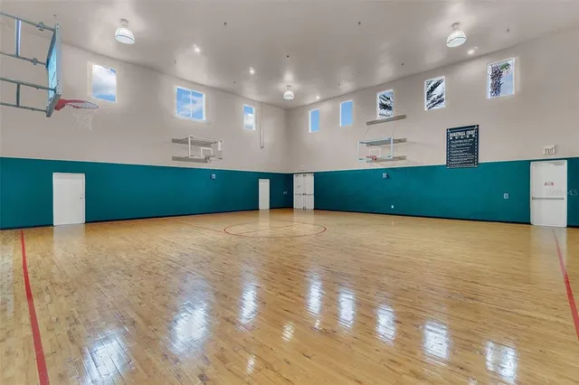 a view of a kitchen with kitchen and a refrigerator