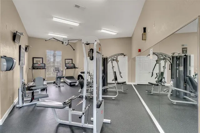 a view of a room with gym equipment