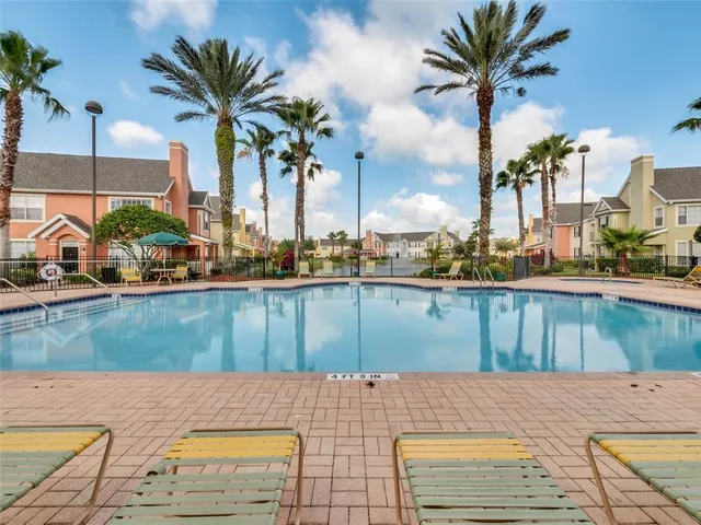 a view of a yard with sitting area