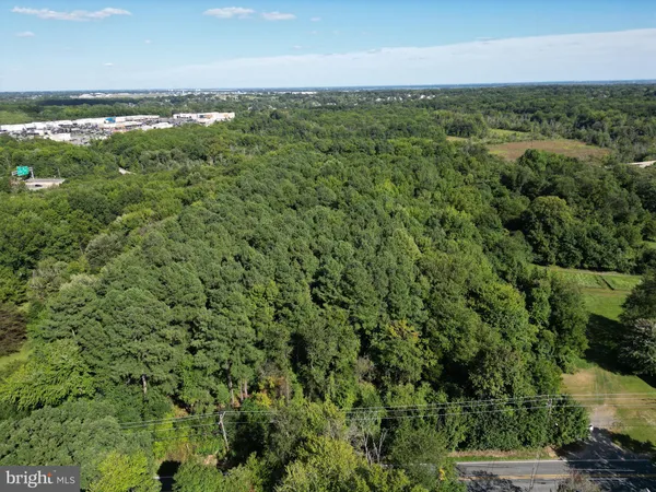 an aerial view of multiple house with outdoor space