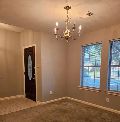 a view of a livingroom with a chandelier