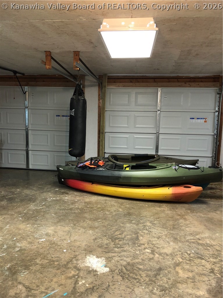 295 Pleasant Valley Acres Road Given, WV 25245 - Photo 23 of 29 2 stall garage also has a workshop
