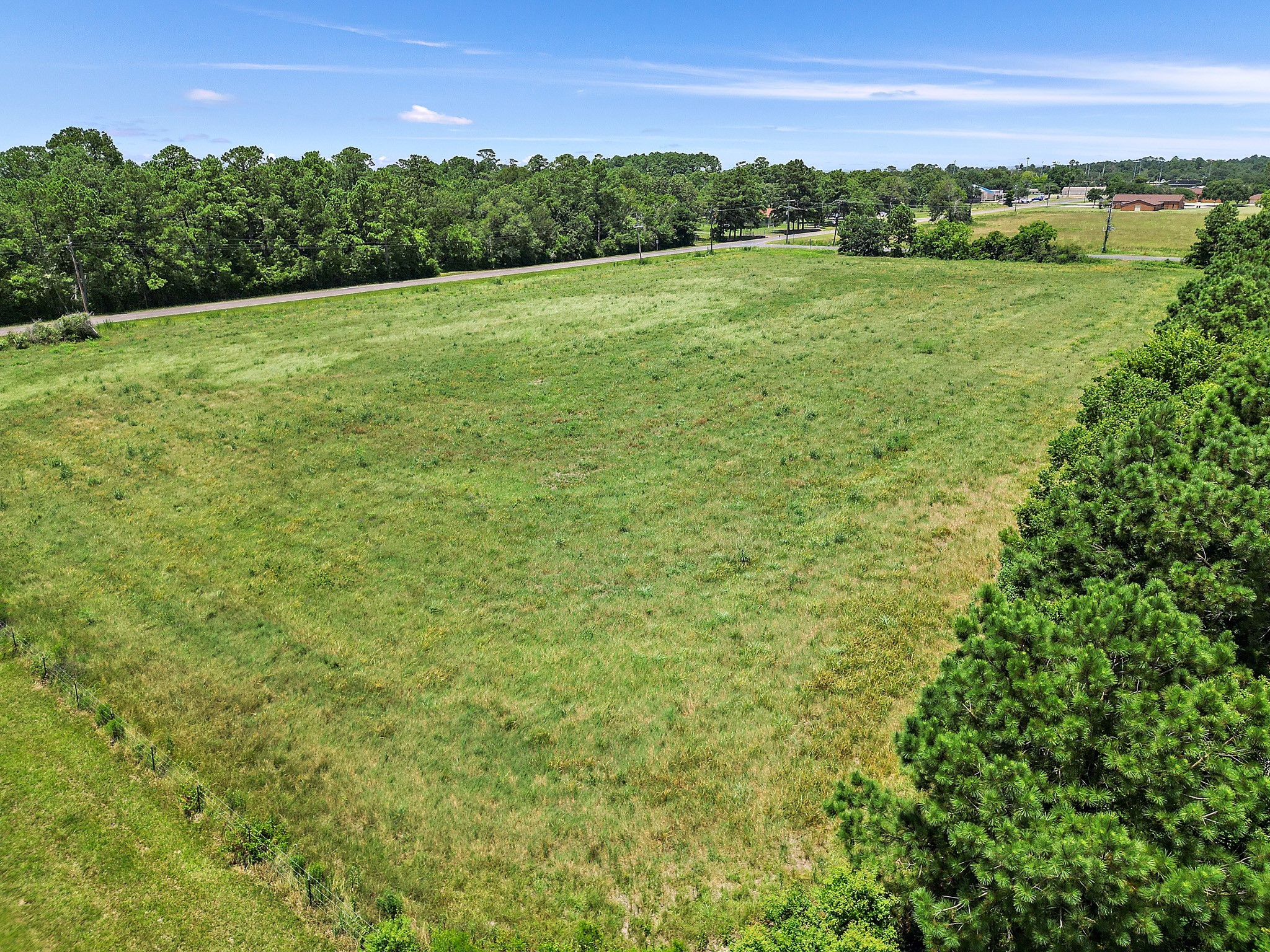 0 South Main Street Anahuac, TX 77514 - Photo 16 of 17 a view of a green field with clear sky