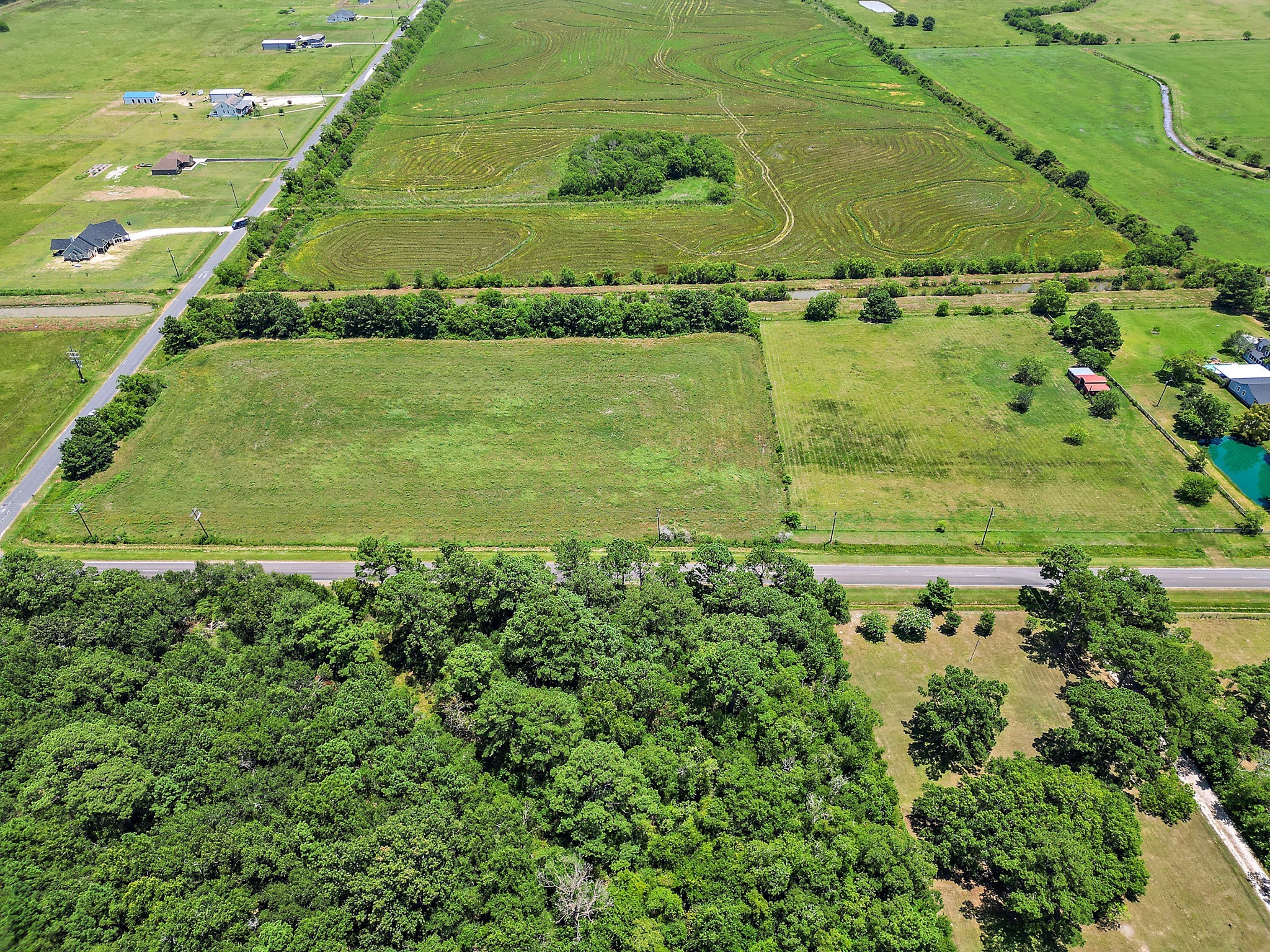 0 South Main Street Anahuac, TX 77514 - Photo 5 of 17 a view of a big yard with large trees