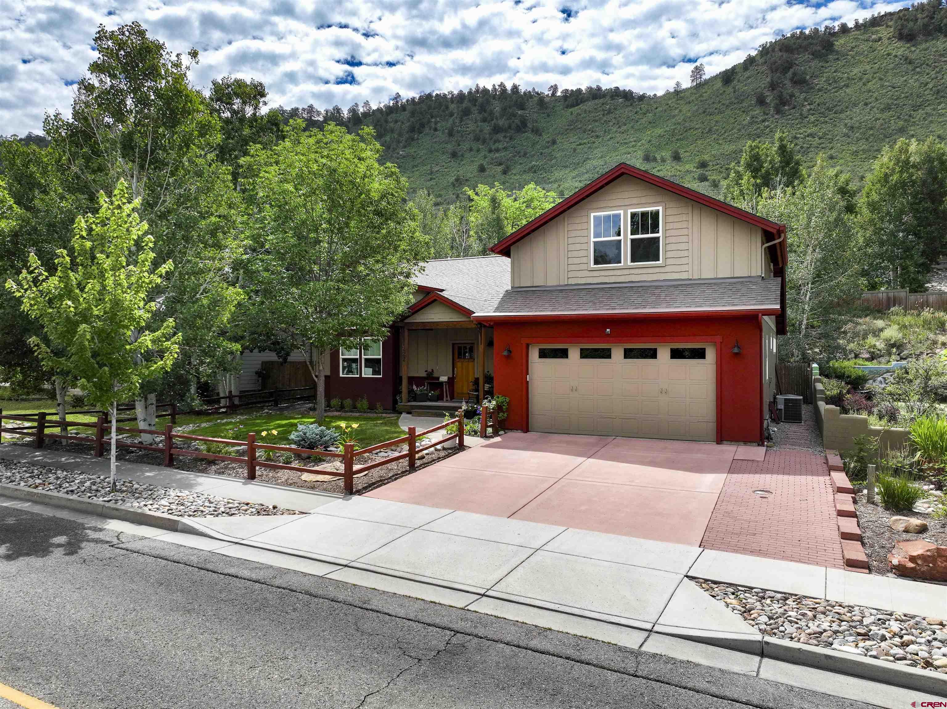 222 Jenkins Ranch Road Durango, CO 81301 - Photo 1 of 30 a view of the house with entertaining space and trees