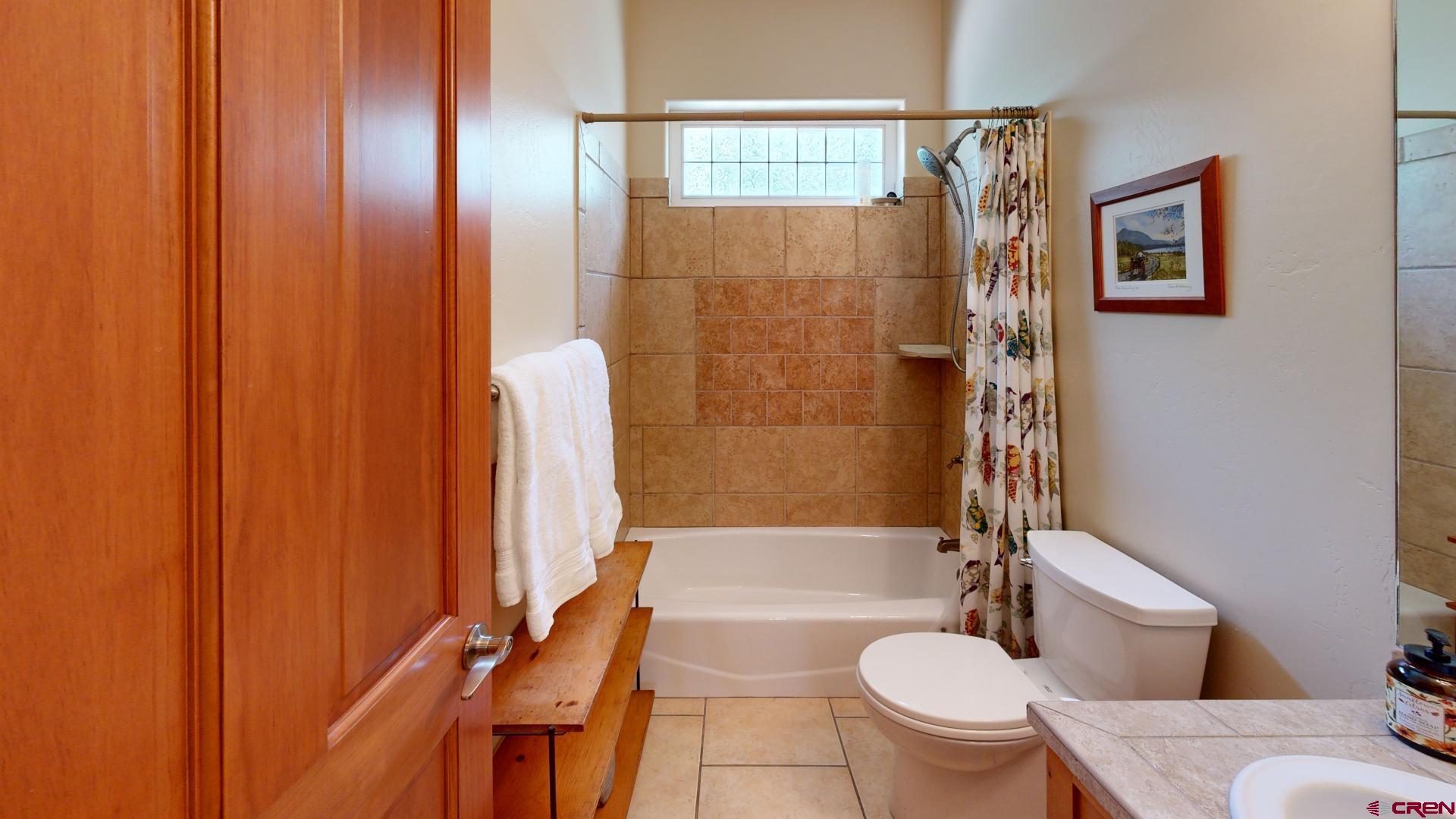 222 Jenkins Ranch Road Durango, CO 81301 - Photo 24 of 30 a bathroom with a sink toilet and shower